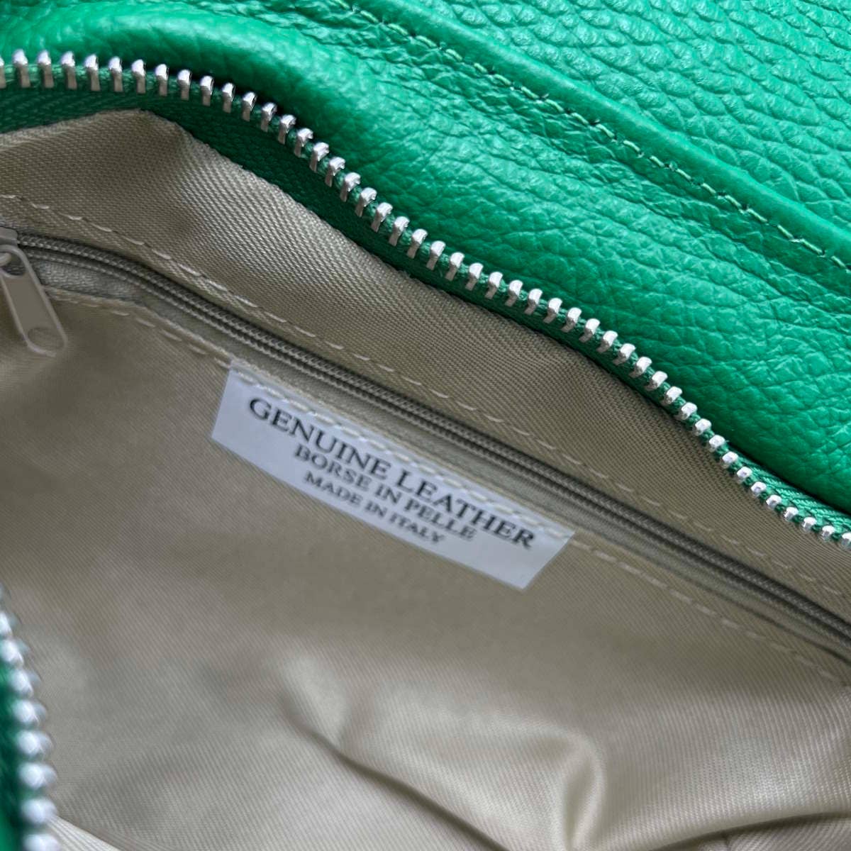 The Siena Pebbled Leather Asymmetrical Saddle Bag